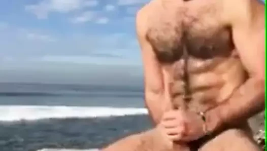 super hot hairy man jerks of on the beach