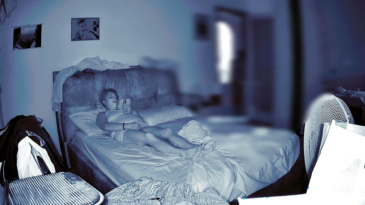 Wife Secretly Masturbates in the Room While Her Husband Is at Home and Watches Her