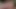 Orta yaşlı seksi kadın çeşmeyi cam duvara fışkırtıyor