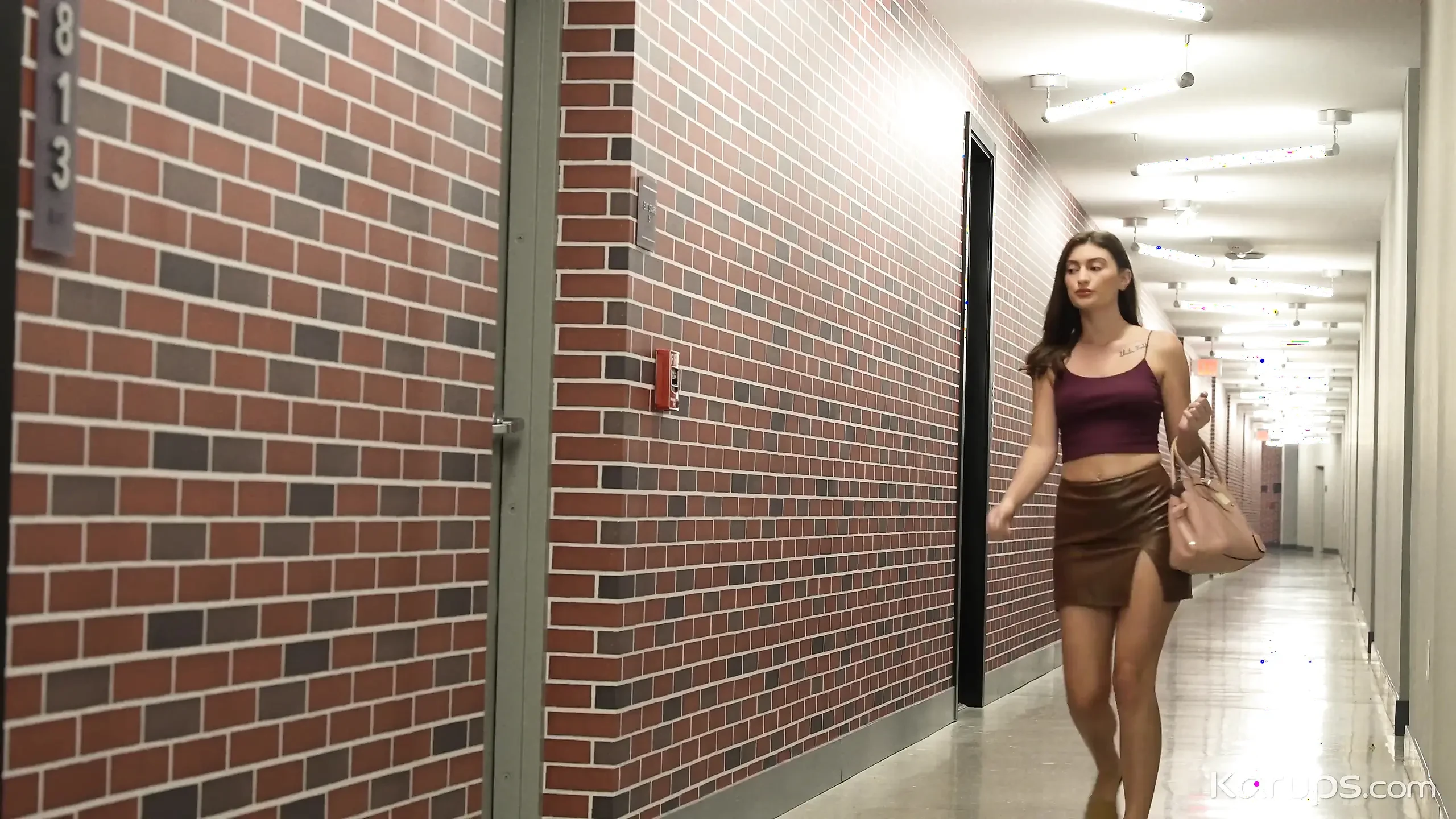 Smoking hot babe gets caught masturbating in the hotel staircase