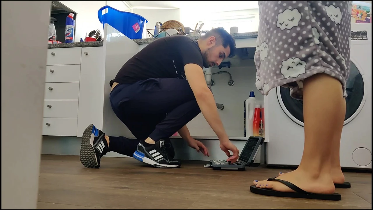 Horny wife fucks handyman under the sink