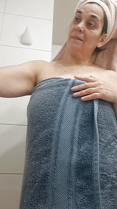 My husband's adult son in the bathroom, performing oral and anal sex, and he discreetly came in my mouth