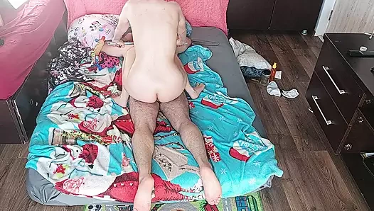 Foreplay in the bedroom with an amateur couple.