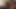 Siyah çoraplı seksi zenci kaltak beyaz sandalyede mastürbasyon yapıyor