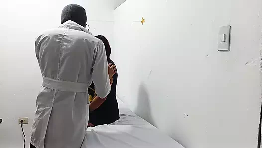 Perverted doctor masturbates cock in the office