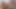 Atletik latin orta yaşlı seksi kadın yatakta mavi bikinisini çıkarıyor