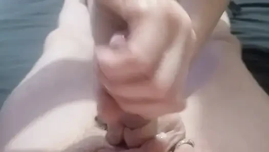 Giving him a handjob with huge explosion