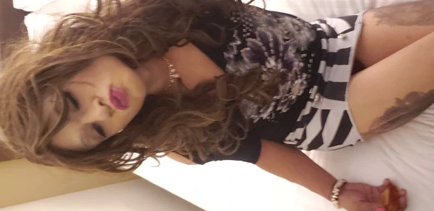 Latina crossdreser playing in bed