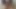 Ateşli kadın büyük zenci videosu izliyor ve kendine dokunuyor.