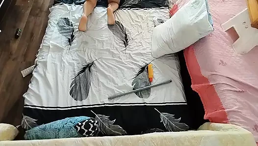 Sensual massage of a hot couple with oil on the body. Foreplay in the bedroom with a couple of amateurs.