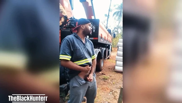 Worker Masturbating at the Construction Site Hidden Behind the Company Truck