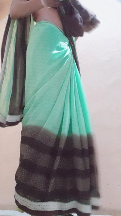 Indian slim crossdresser boy wearing panty in a green saree