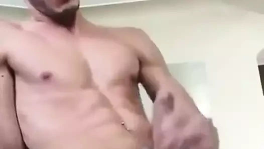 handsome guy with a big dick jerks of