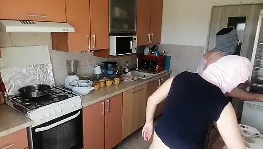 Amateur couple cooks naked in the kitchen