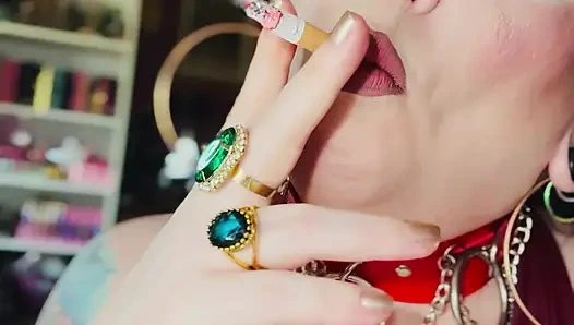 Leather Clad Tina Snua Smoking A Cigarette With Lots Of Dangles