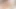 Dövmeli genç milf telefondaki pornoya bakar ve parmaklarıyla kendini okşar.