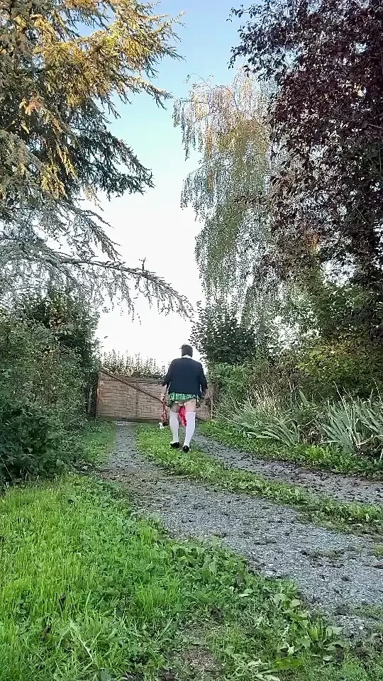 Dressed in a little plaid pleated skirt for a night out
