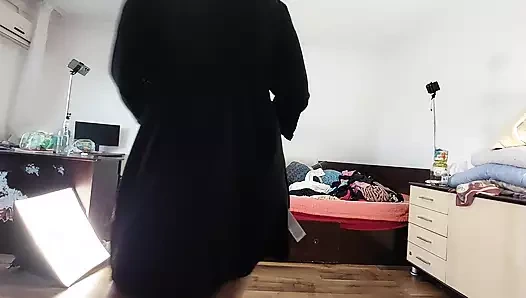 Sexy mom has fun trying on clothes and cutting them. Brunette hairy pussy, big tits.
