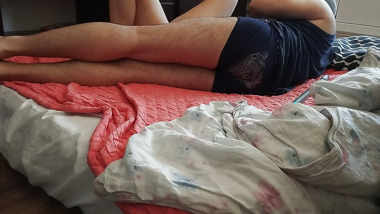 Foreplay in the bedroom with an amateur couple.