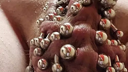 6mm barbells all along centre of scrotum , even heavier balls