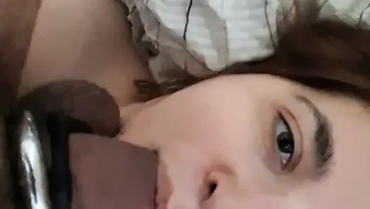 Sitting on top of me, he fills my greedy mouth with his thick cock that I swallow up to the balls while watching him