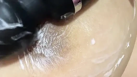 Mom vibrates her big tits with her big vibrator