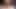 Üstsüz orta yaşlı seksi kadın sigara içiyor