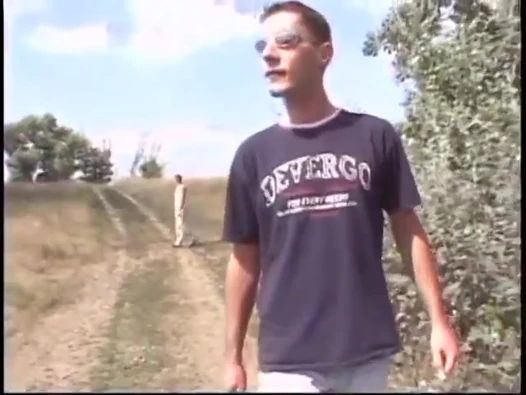 Bottom boy gets on his knees and deep throats a hard cock then fucks outdoor