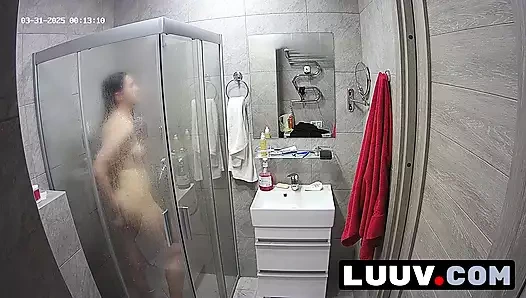 LUUV. A brunette showers, used to amateur cameras, showing her natural body