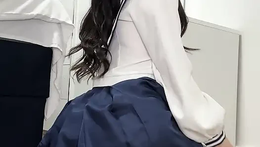 Sexy Black Haired Teen in Japanese School Uniform Undresses on Floor