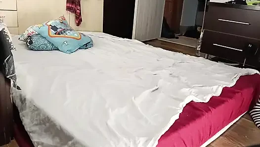 Sexy brunette doing naked chores around the house.