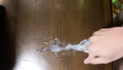 Quick wank with big cock loads of cum ob the table
