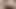 A mature milf's vagina makes noise due to the moisture after a shower.
