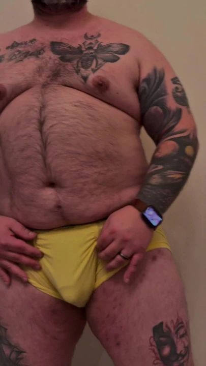 Hairy tattooed chubby bear