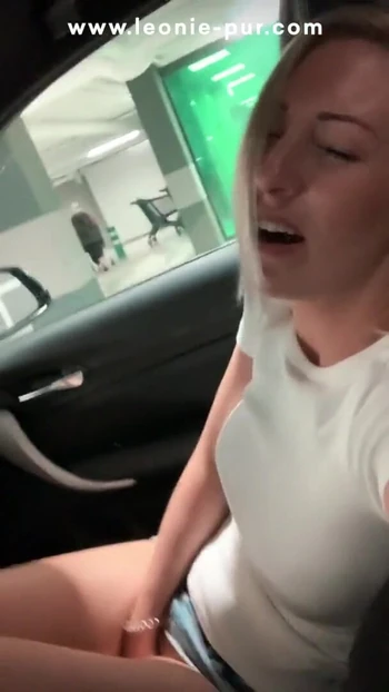 Key moment from "Tight pussy fingered to orgasm in the public parking garage"
