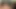 Olgun lateks dominatrix tasmalı çıplak kölelere komut veriyor