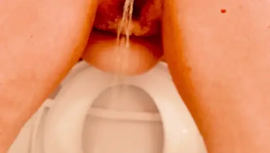 Pissing different ways around the bathroom