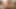 Kaltak uzun bir dildoyla amını sikerken parmaklarını kıvırıyor