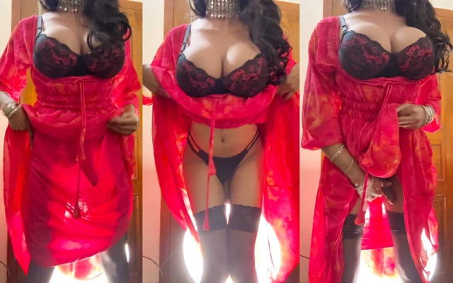 Kırmızı elbiseli büyük memeli travesti