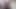 Travesti çizme, file, kırmızı pvc elbise ve korse ile giyiniyor