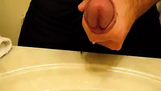 Asılı horoz veren bir spritzing