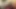 Seksi ve yaramaz travesti mastürbasyon yapıyor ve ayaklarına boşalıyor