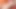 Pirsingli meme uçlu orta yaşlı seksi kadın çıplak yatarken minyon göğüsleriyle oynuyor