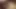 Siyah çoraplı orta yaşlı seksi kadın içindeki zevki almak için bacaklarını açıyor