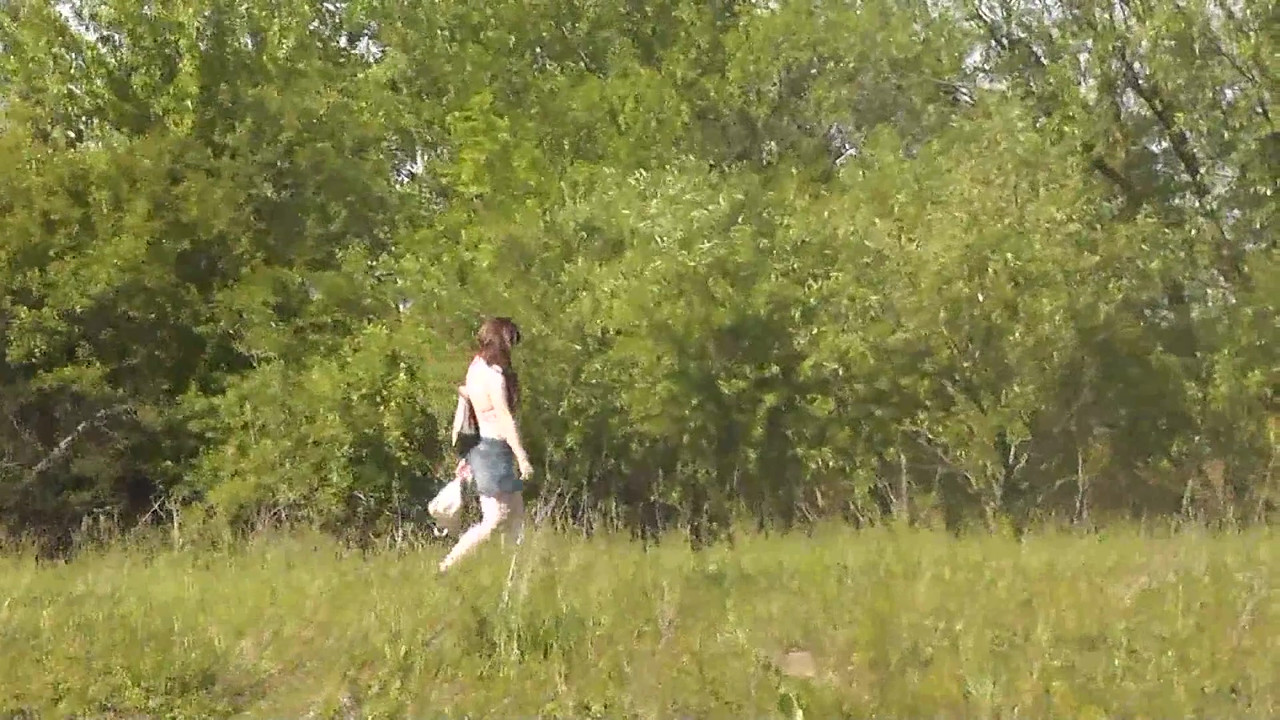 Wild beach. Sexy MILF Platinum on shore of lake stripped naked, fingers masturbating pussy and strong orgasm. Nudist beach.