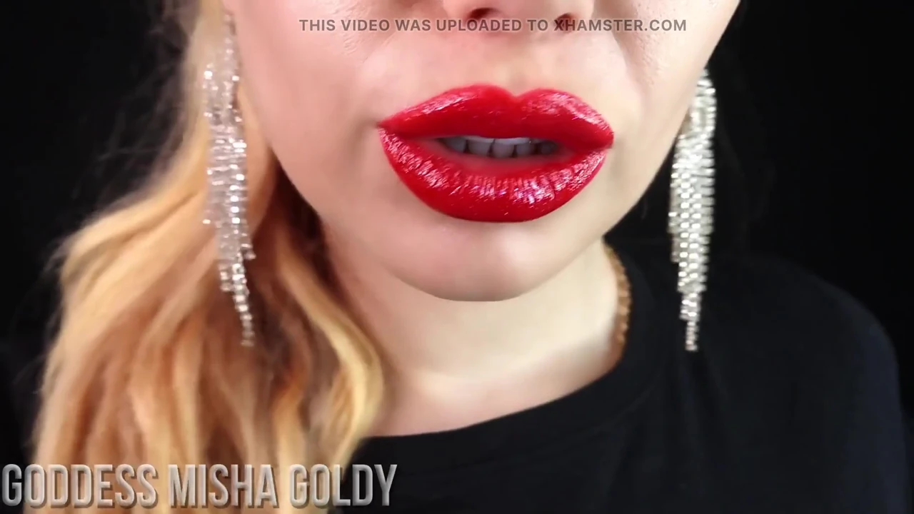 Close-up red lips smoking tease