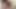 Tombul kız odayı topluyor ve kıyafetlerini katlıyor