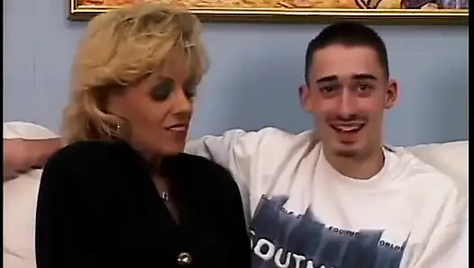 Hot blonde gets bent over and fucked doggystyle on the couch