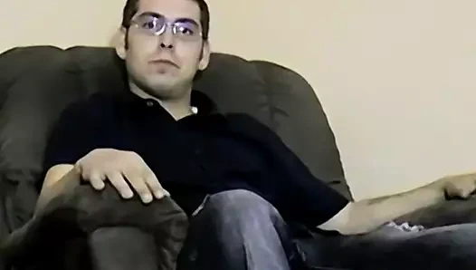 Nerdy amateur with glasses strips to jerk off until he cums