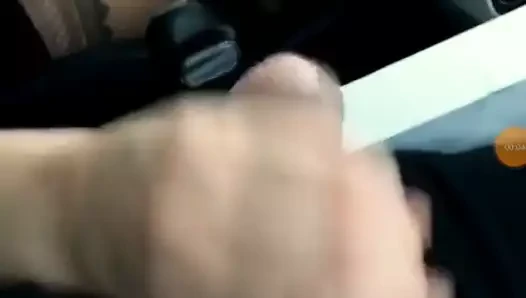 She jerks him off while driving